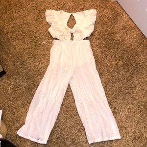 White crop leg jumpsuit. Incredible detail